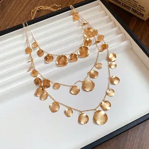 Elegant multi-layered gold necklace with textured crumpled round sequin charms for women