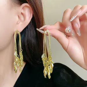 Detailed view of elegant gold leaf wheat ear tassel earrings with S925 silver needles