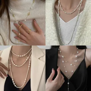 Elegant Korean style long pearl necklaces for layered styling on autumn sweaters