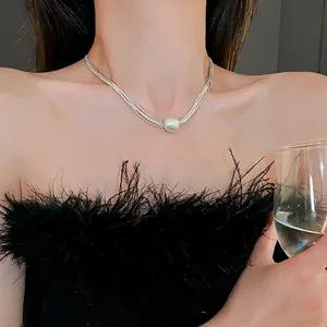 Modern silver multi-layer clavicle necklace featuring a central pearl bead for women