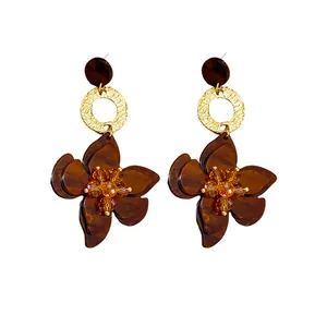 Vintage resin flower drop earrings with hammered gold rings and silver needle studs