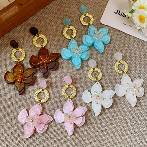 Detailed view of elegant multi-layer resin flower pendant earrings in four pastel colors.