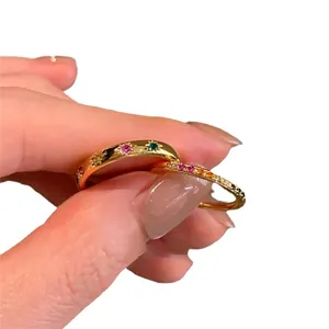 Golden 2-piece ring set with star-set colorful cubic zirconia and rainbow eternity band