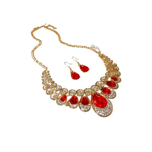 Elegant red crystal teardrop necklace and earrings jewelry set with luxurious gold finish