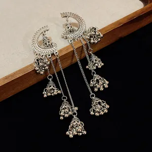 Vintage silver palace style tassel earrings with long dangling jhumka bells detail