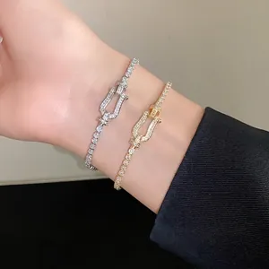 Elegant zirconia horseshoe buckle bracelets in gold and silver tones for stylish women