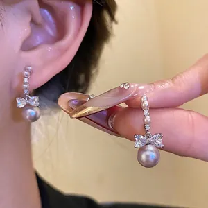 Elegant Bowknot Artificial Pearl Drop Stud Earrings Zirconia Inlaid Copper Earrings For Women Wedding Party Luxury Jewelry