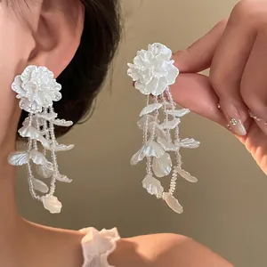 Elegant French style white floral tassel earrings featuring long beaded petal drops for women