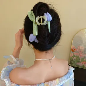 Detailed back view of a sweet tulip mesh ribbon hair claw clip for elegant bun styles