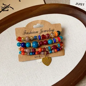 Bohemian multi-layer colorful beaded bracelet set with engraved gold heart charm