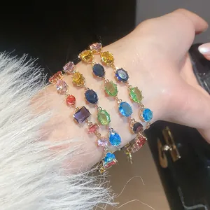 Close-up of four luxury colorful zircon bracelets featuring multi-shaped gemstones