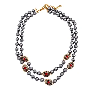 Vintage double-strand grey pearl necklace with red gemstone and gold accents