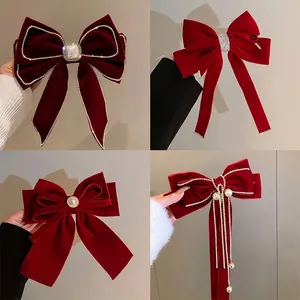 Red velvet bow hair clip set with elegant pearls, rhinestone borders and long tassels