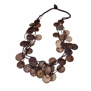 Retro ethnic style irregular coconut shell tassel necklace for a unique handmade look.
