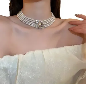 Vintage multi-layer pearl choker necklace with sparkling rhinestone zircon centerpiece