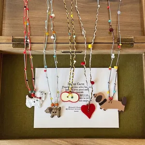 Handmade cartoon puppy and heart pendant necklaces with colorful beaded wax ropes