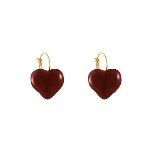 Elegant Ankara red enamel heart hoop earrings with a vintage minimalist gold finish