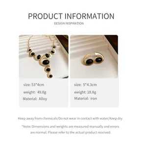 Parure de bijoux vintage en or avec pierres noires, collier et boucles d'oreilles