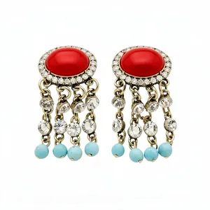 Orecchini vintage a nappa dorati con cabochon rosso e dettagli in strass lucidi