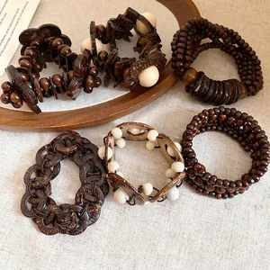 Set di bracciali etnici vintage in legno e cocco fatti a mano per tutte le donne