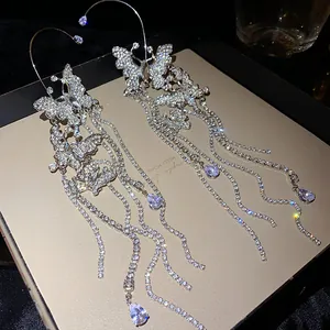 Exquisite detail of butterfly tassel ear hooks adorned with sparkling cubic zirconia