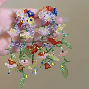 Handcrafted colorful floral glass bead drop earrings in vibrant dopamine style colors