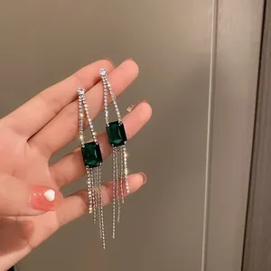 Elegant emerald green long tassel earrings with sparkling rhinestones for evening gala