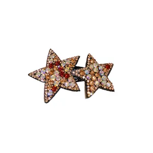 Sparkling Y2K star-shaped hair clip set with shiny multicolored rhinestones on white