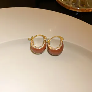 Elegant gold-plated hoop earrings with brown enamel and sparkling micro-inlaid stones