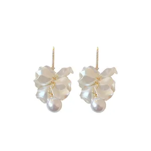 Elegant 18K gold-plated petal earrings with drop pearls and shimmering zircon studs