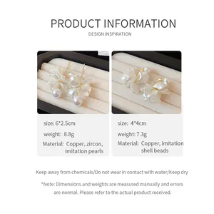 Detail view of 18K gold plated flower petal earrings with pearl accents and sizes