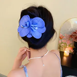 Elegant blue fabric orchid hair clip with pearl detail for women summer vacation