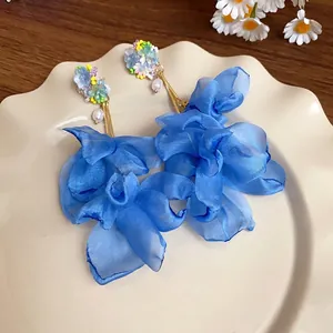 Elegant blue chiffon flower earrings with handmade beadwork and pearl accents