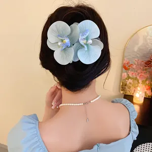 Elegant fabric orchid flower duckbill hair clip with pearl detail for stylish updos