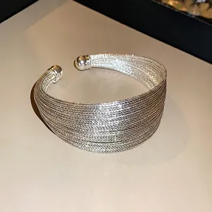 Elegant silver multi-layer mesh cuff bracelet with a luxury open-end design for women.