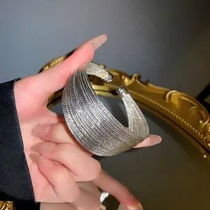 Elegant multi-layer silver plated open cuff bracelet with sparkling fine textured strands