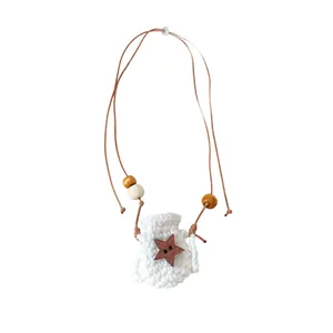Handmade crochet pouch necklace with wooden star button and beads on a brown cord
