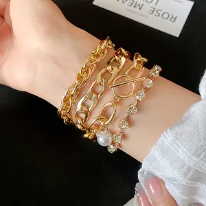 Multi-layered gold-tone chain bracelet set with elegant pearls and rhinestones