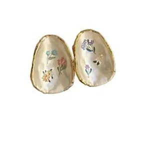 Elegant floral enamel earrings with sweet gold-toned edges for a minimalist look