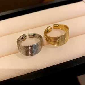 Set of gold and silver minimalist multi-layer adjustable wire rings for women