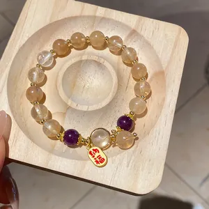 Glasperlenarmband im neuen chinesischen Stil mit gelben und lila Perlen