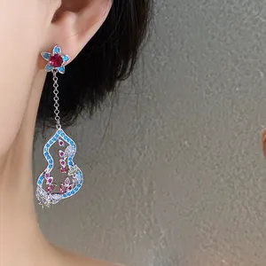 Detailed view of New Chinese style silver earrings with zircon flower and gourd tassel
