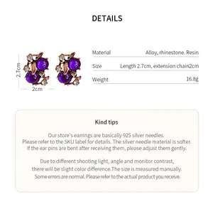 Detailed product view showing size and material of purple resin leaf stud earrings