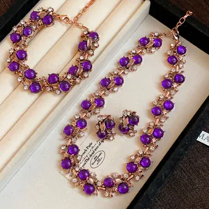 Exquisite purple floral jewelry set including necklace, bracelet and earrings in a box