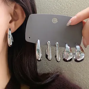 Elegant minimalist irregular geometric silver-toned earrings for women, high-end fashion