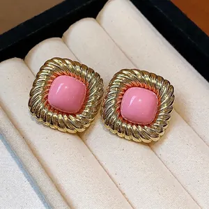 Elegant vintage gold twisted square stud earrings with pink cabochon center for women