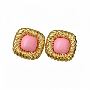Elegant gold twisted square earrings with pink center stone and pleated metal frame for women