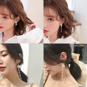 Elegant pearl tassel long drop earrings for women with French silver needle design style