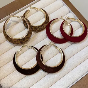 Vintage flocked large hoop earrings set in leopard, burgundy, and dark brown styles