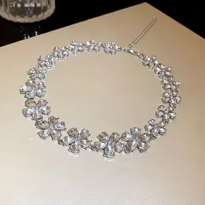 Exquisite flower-shaped choker necklace featuring sparkling crystals with a silver-tone finish.